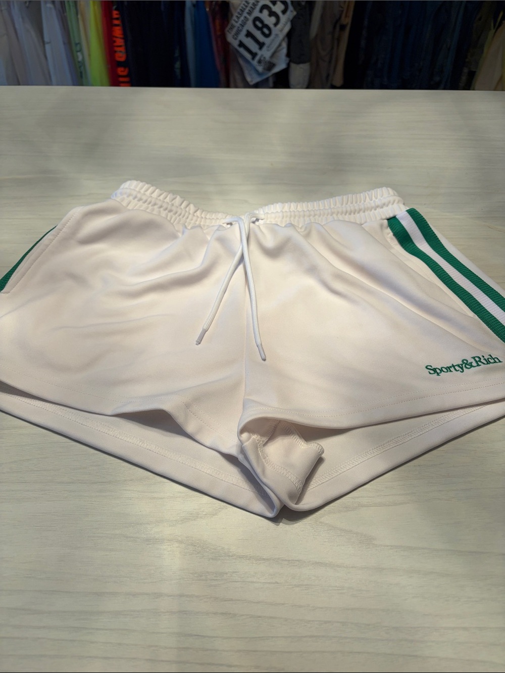Sporty & Rich White Athletic Shorts with Green Stripes